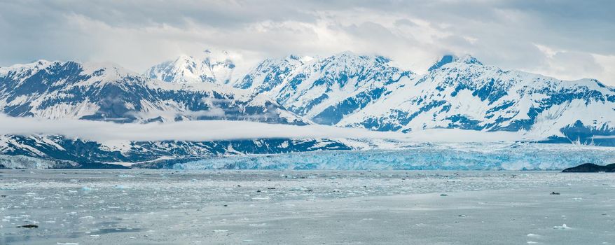 Wide view of the famous Hubbard Glacier as it enters the ocean on the Alaskan coast south of Valdez