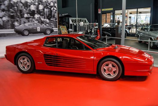 SINSHEIM, GERMANY - MAI 2022: red Ferrari Testarossa sports car 1988 390ps