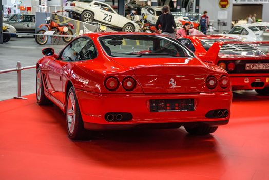 SINSHEIM, GERMANY - MAI 2022: red Ferrari 575 M Maranello sports car 2002 515ps rear view