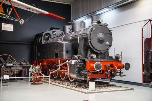 SINSHEIM, GERMANY - MAI 2022: black red steam locomotive.