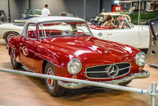 SINSHEIM, GERMANY - MAI 2022: red Mercedes Benz 190 SL 1958 105ps