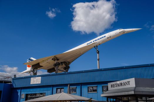 SINSHEIM, GERMANY - MAI 2022: white supersonic airliner Concorde F-BVFB 1969 and gray orange Aero L-39 Albatros 1968