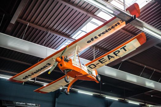 SINSHEIM, GERMANY - MAI 2022: white orange Himmelslaus experimental aircraft double winged.