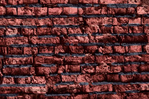 a small rectangular block typically made of fired or sun-dried clay, used in building. Big mate full background of detailed old red brick wall