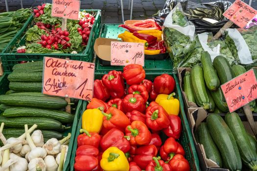 Bell pepper, cucumber and courgette for sale at a market