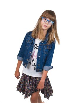 teen girl in glasses and denim jacket on a light background