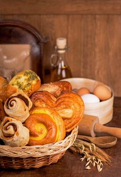 fresh bread and wheat on the wooden