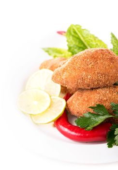 two fried breaded cutlet isolated on white background