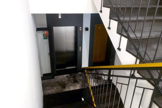 Interior of a modern building. Stairs in the building. Emergency exit