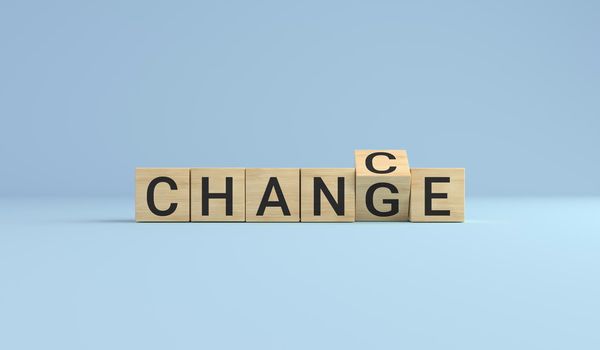 Change for chance concept. Wooden cube block flip over word change to chance on blue studio background. business concept. 3D rendering.