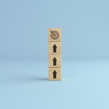 Target up. Arrow up with wooden cube blocks tower with target icon on white background. Concept of business strategy and action plan. 3D rendering.