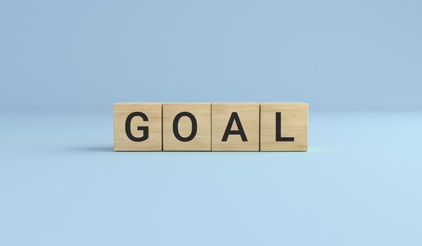 Goal word made with wooden cube blocks. business concept. 3D rendering.