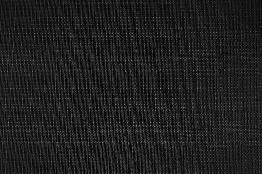 Black close-up fabric and texture background.