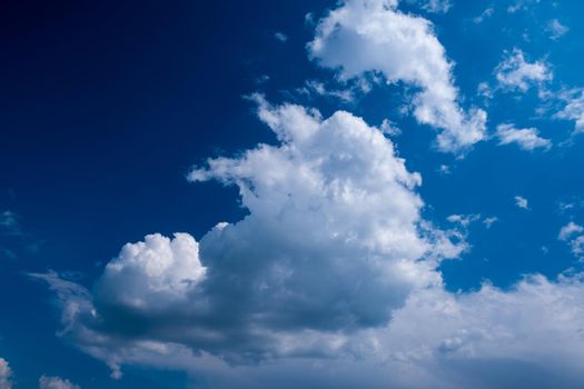 blue sky with white clouds. amazing blue sky. Cloudy sky background in clear weather.