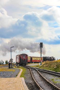 Lower Saxony Germany 12. September 2010 Brockenbahn Locomotive and railway train at the forest and landscape panorama at Brocken mountain peak in Harz mountains Wernigerode Saxony-Anhalt Germany