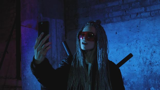 a girl with dreadlocks and katanas stands by a neon brick wall and takes a selfie on a mobile phone 4k