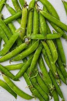 Pods of green peas,, top view flat lay