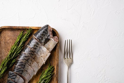Fresh fish mackerel set, on white stone table background, top view flat lay, with copy space for text