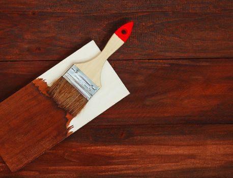 Tassel and wood stain pattern on wood background.Woodwork texture.