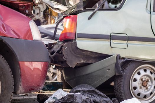Traffic accident on the street, damaged car after a collision in the city. Accident due to speeding and alcohol intoxication. Transport background. The concept of road safety and insurance