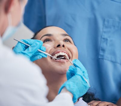 Shot of a young woman having a dental checkup.