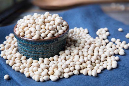 Fresh edame beans in pods in bowl from above