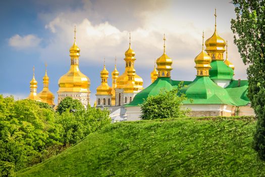 Kyiv Pechersk Lavra golden domes at sunlight - Ukraine