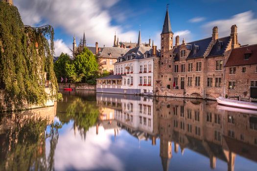 Long exposure of Rozenhoedkaai at sunrise in Bruges, Flanders - Belgium