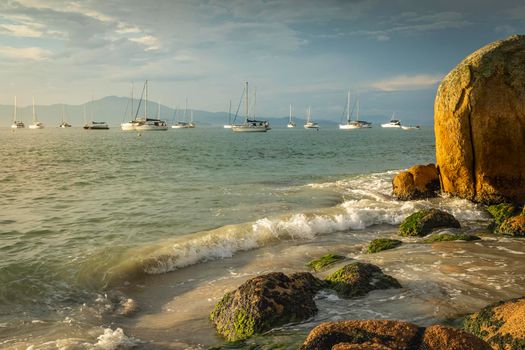 Bay with boats and sailboats in Jurere Internacional at sunset Florianopolis, Brazil