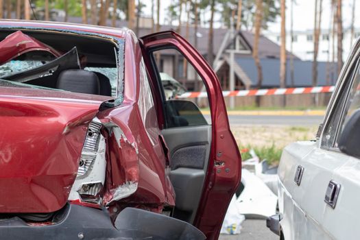 Shot car during the war in Ukraine. A car after an accident with a broken rear window. The wreckage of the interior of a modern car after an accident, a detailed close-up view of the damaged car