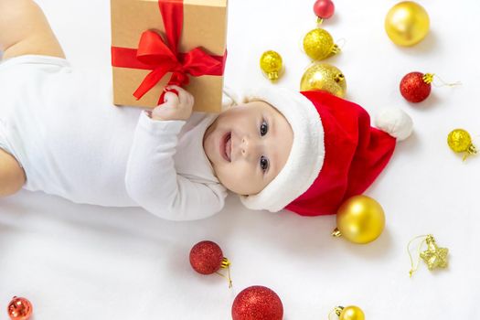 Christmas photo of baby with New Year's decor. selective focus. holiday.