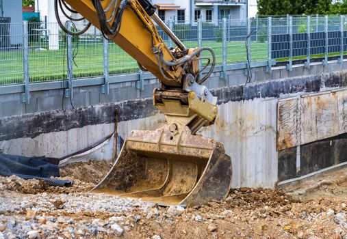 Digger bucket close-up. Construction excavator bucket.