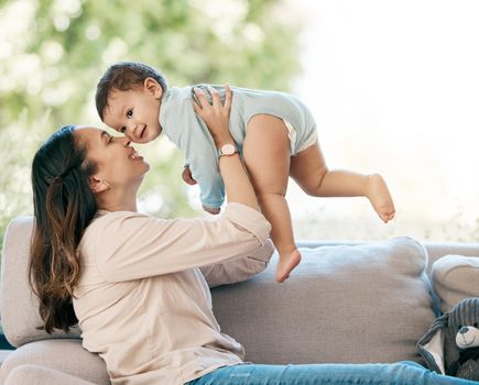 Shot of a young mother bonding with her adorable baby at home.