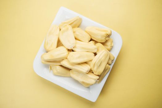 top view of slice of jackfruits in a bowl on table