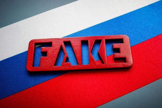 A Russian flag and fake sign. Propaganda concept.