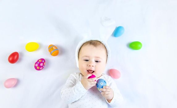 Happy easter baby holiday concept on white background. Selective focus. Child.