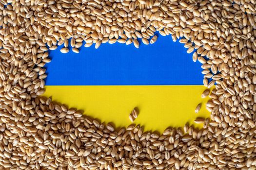 Wheat grain on Ukraine flag. Concept of grain floating export problems