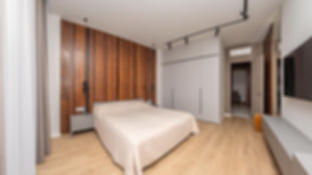 abstract blur hotel bedroom interior for background Abstract blur and defocused of long building hallway, apartment, condominium, hotel, commercial office building.