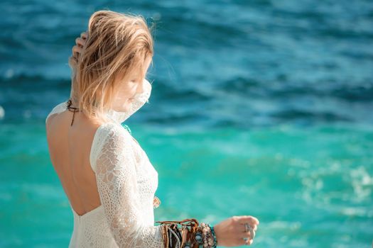 fashionable young model in boho style dress