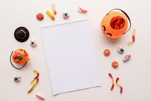 Halloween concept. Blank calendar mock up design with halloween decorations and sweets