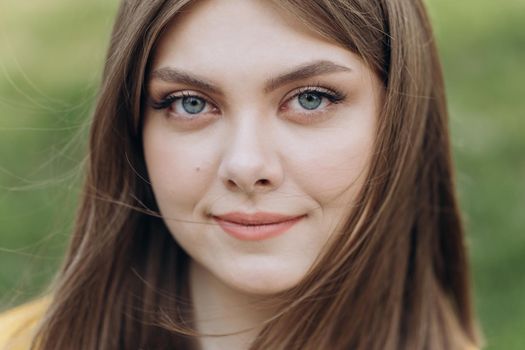 Front close up of caucasian woman, beautiful young human face with white skin, smile look at camera open and confident. Portrait of caucasian european lady