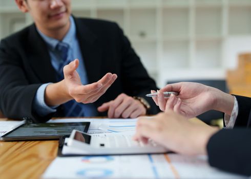 business people working together on a new project to analyze budgets and manage investment risks in today's profit boosting for marketing in the office room.