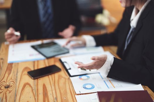 business people working together on a new project to analyze budgets and manage investment risks in today's profit boosting for marketing in the office room.