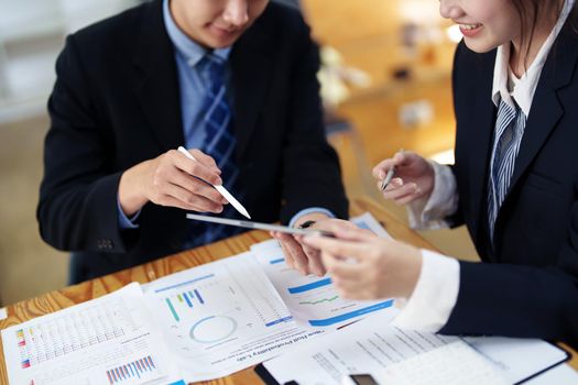 business people working together on a new project to analyze budgets and manage investment risks in today's profit boosting for marketing in the office room.