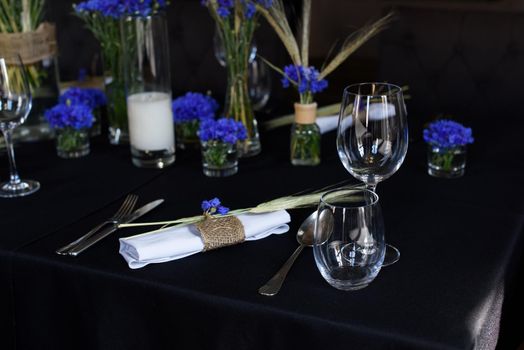 A set of furniture in a cafe. Vase with flowers decor for the restaurant.