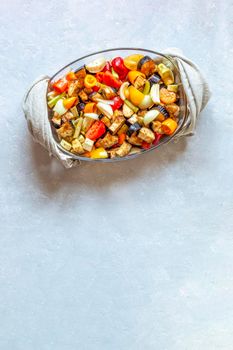 oven dish with baked vegetables, family size, top view, copy space