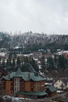 Ukrainian karpaty mountains winter landscape. Village among mountains. Polyanytsya, Ukraine - 04.01.2022