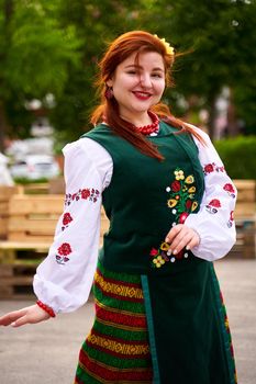 Portrait of gorgeous Ukrainian women in national dressing. Ukrainian vyshyvanka day. Dnipro, Ukraine - 05.19.2022