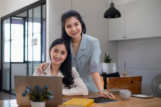Young asian business woman working together at office. LGBTQ Concept