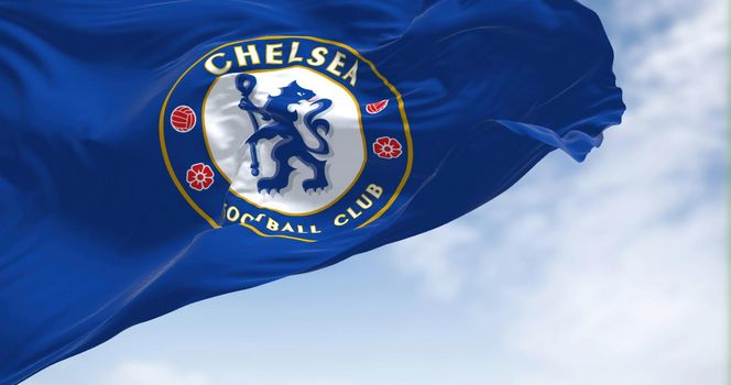 London, UK, May 2022: The flag of Chelsea Football Club waving in the wind on a clear day. Chelsea F.C. is a professional football club based in Fulham, London
